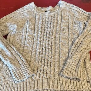 American Eagle Outfitters Cream Knit Sweater large has gold sparkled thread.